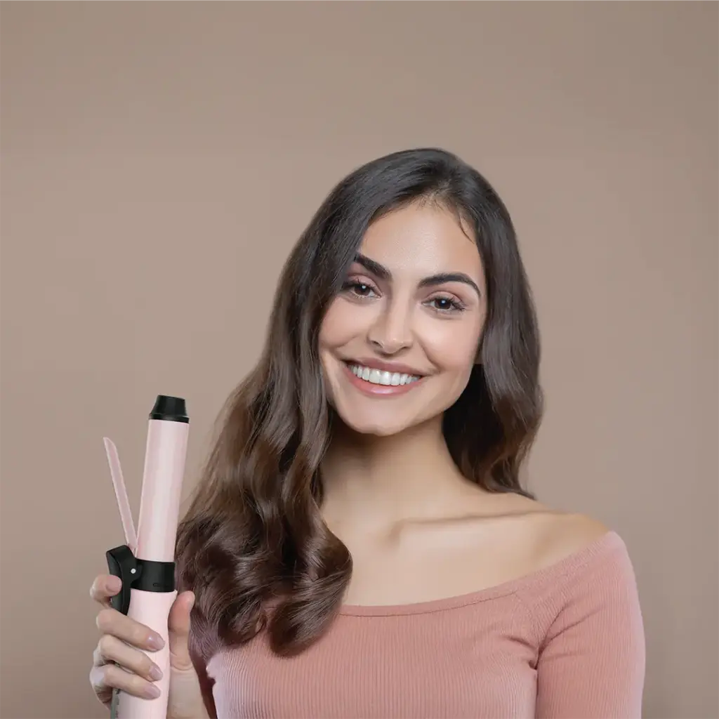 Portable curling iron pink color