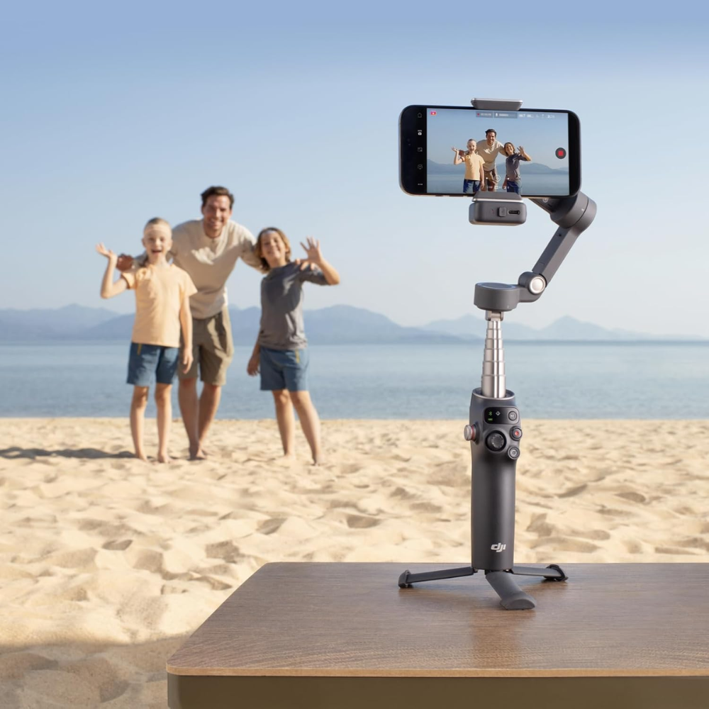 DJI Osmo Mobile 7P smartphone stabilizer capturing family moments on a beach