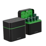 Black and green electronic device with battery compartments on a white background