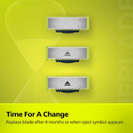 Three razor heads on a yellow background with text about blade replacement.